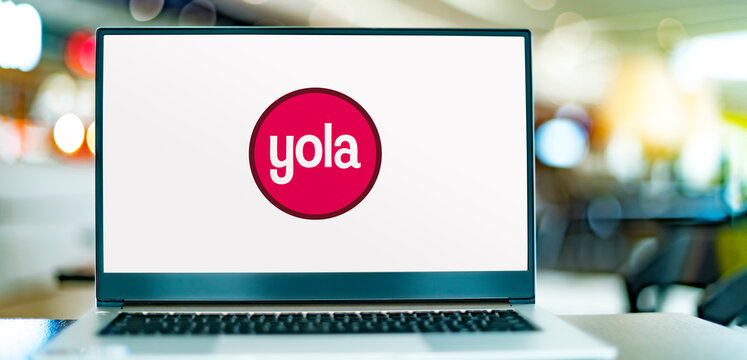 Laptop computer displaying logo of Yola