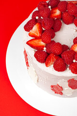 a very tasty cake with strawberries
