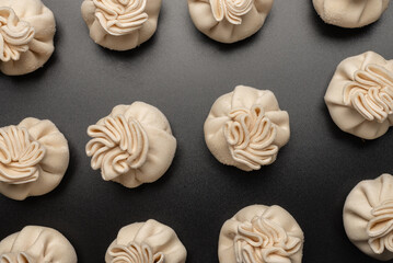 Traditional raw khinkali, georgian cuisune.