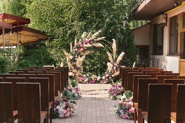 Natural wedding arch outside. Wedding ceremony place