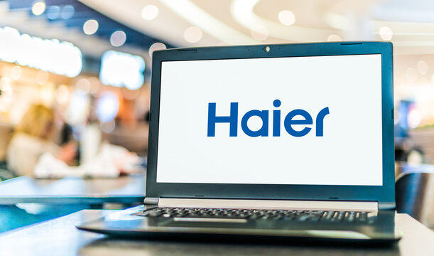 Laptop computer displaying logo of Haier Group