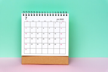 July 2022 desk calendar on color block background