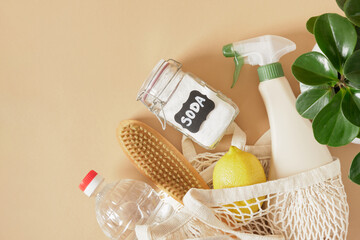 eco cleaning concept, cleaning using non-toxic products, a can of soda, a spray bottle with an eco...