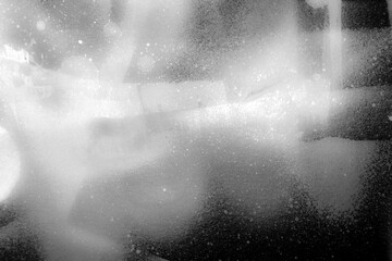 白と黒の絵具が滲むテクスチャ背景