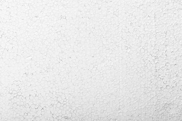 Abstract close up texture photo of compressed white styrofoam background..