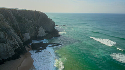 big and perfect waves at Praia Grande in Sintra