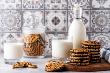 milk and chocolate cookies on a light background