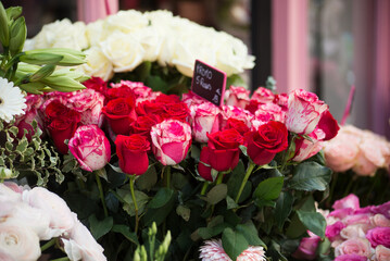 closeup of red and pink  roses bouquet at the florist in the street