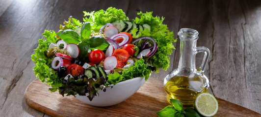 Composition with a vegetable salad bowl