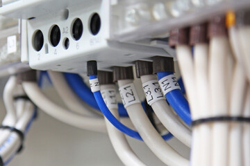 Connection of the mounting wires to the  circuit breakers in the control panel.