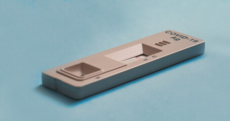 Fototapeta premium Covid-19 Antigen Test - Sars COV 2 indicator on a blue background.