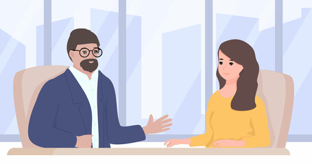 Fototapeta premium Serious male and female sitting at the desk and discussing problems. Man and woman telling their expert views on business, politic, economic situation.
