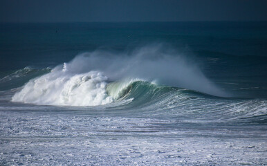 Perfect wave breaking in a beach. Surf spot