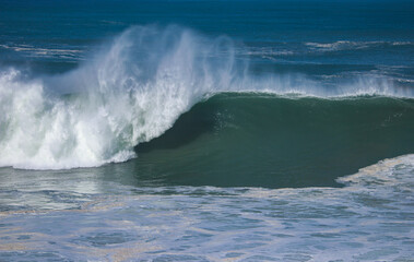 Perfect wave breaking in a beach. Surf spot