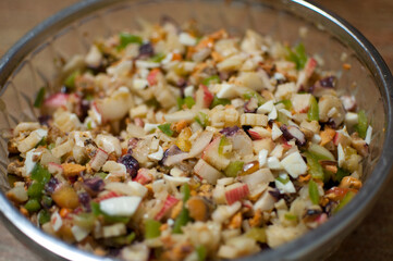 Healthy salad with octopus, mussel, egg, onion, paprika, salt and olive oil. In a glass bowl, ready to eat.