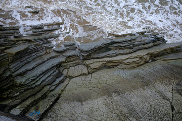 Waves hitting the cliffs