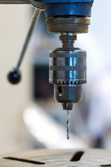 Drill of a milling machine closeup, selective focus