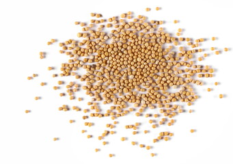 Yellow mustard seeds isolated on white, top view