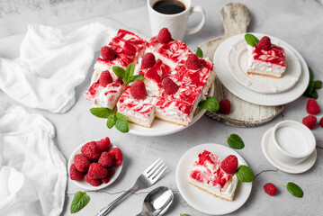 Raspberry bar cheesecake with whipped topping and fresh raspberries. tasty dessert. 