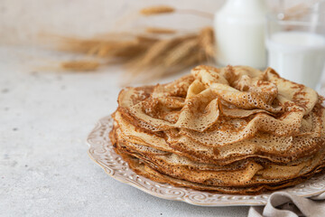 Homemade crepes on a white plate