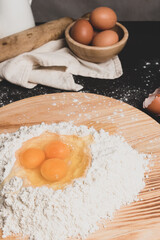 Flour and eggs as ingredients for making pasta dough