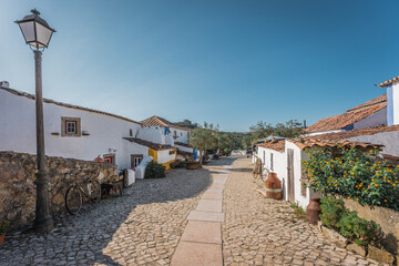 Main Street of small traditional Portuguese village in Lisbon region