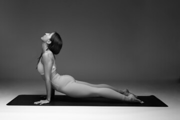 Naklejka premium Upward Facing Dog Pose. Yoga Postures