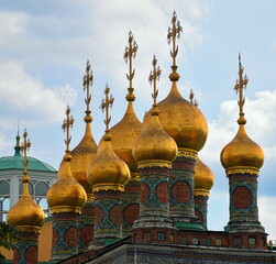 Golden onions of an orthodox  church in the Kremlin of Moscow