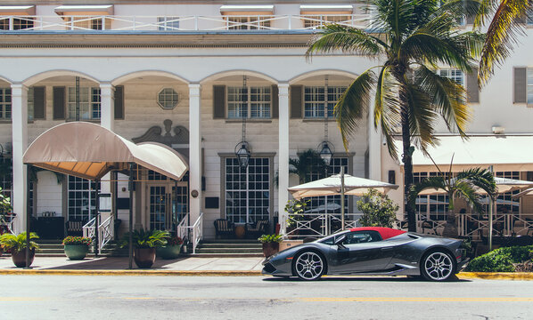 Luxury car in front of boutique hotel