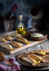 Homemade pastries with cheese on a rustic table