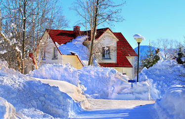 Cottage among the snowdrifts