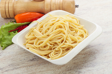 Italian pasta boiled spaghetti with oil