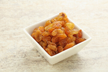 Sweet yellow raisin in the bowl