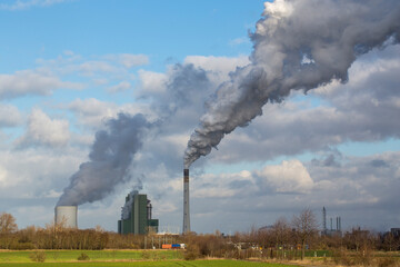 Fototapeta na wymiar renewable energy or fossil fuels, view at the coal-fired power station of Schkopau, Saxony-Anhalt, Germany