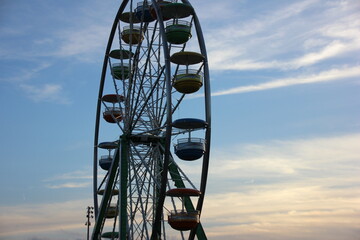 ferris wheel on a blue sky