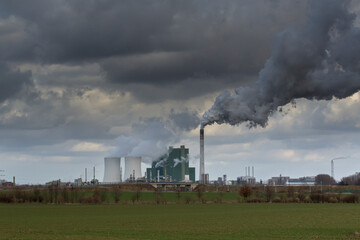 renewable energy or fossil fuels, dark clouds above the coal-fired power station of Schkopau, Saxony-Anhalt, Germany