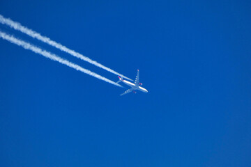 airplane in the blue sky