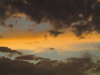 Fototapeta na wymiar Sunset skies with storm clouds