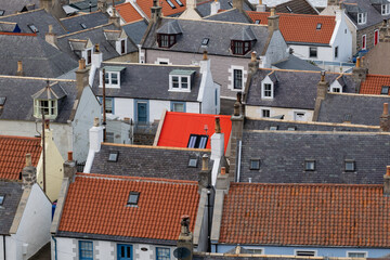Fototapeta na wymiar 25 February 2022. Seatown, Cullen, Moray, Scotland. This is view from the old railway line looking on the roofs of the houses in the Seatown part of Cullen.