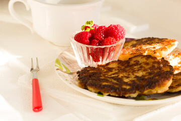 Closeup pancakes and raspberry on a plate breakfast morning food eat yummy dessert sweet bakery pastry baked nobody cafe kitchen berry isolated berry