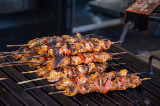 Roasting Frigarui ,skewers,on an outdoors grill