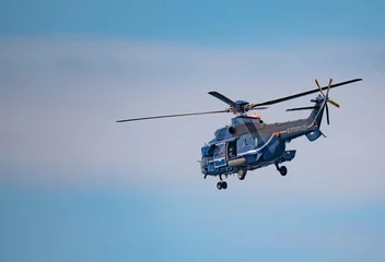 Foto auf Acrylglas German Federal Police helicopter in flight © Axel Jahnke