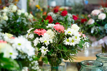 Obraz na płótnie Canvas Assortment of bouquets of flowers for sale in the store
