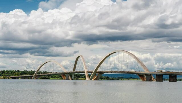 Zoom in time lapse view of dramatic skies over JK Bridge by day in Brasilia, Federal District and capital of Brazil, South America.