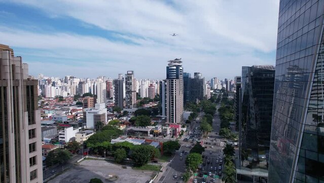 Aerial view of Avenida Brigadeiro Faria Lima, Itaim Bibi. Iconic commercial buildings in the background. With mirrored glass