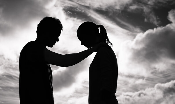 Man comforting his sad troubled friend, partner. Friendship, and mental support concept 