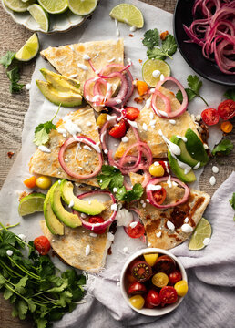 Quesadilla with avocado, onions and limes