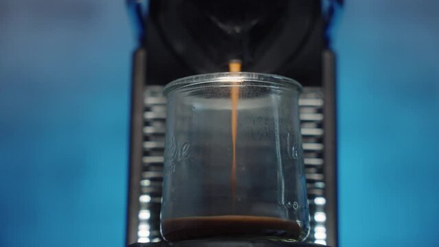 resh espresso filling glass with crema slow motion 4k 30fps