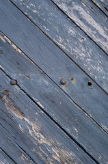 deteriorated wood panels surface texture close-up.