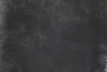 cement rough texture of the black wall.